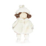 Stuffed doll in a white outfit with a hat on a white background
