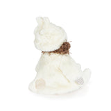 Plush doll with brown hair and a white coat on a white background