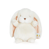 Cream plush bunny toy with a visible brand tag on a white background