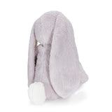 Purple plush bunny with long ears on a white background