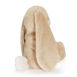 Beige plush toy with long ears on a white background