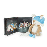 Children's book with illustrations of bunnies and a plush toy puppy wearing a blue nightcap on a white background.