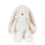 White plush bunny with patterned ears on a white background