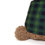 Plush toy with a green and black checkered pattern on a white background