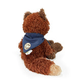 Brown plush fox toy with a blue bandana on a white background