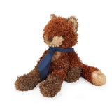 Brown fox plush with a blue bandana on a white background