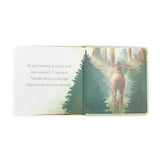 Open book with a moose illustration and text on a white background