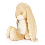 Beige plush bunny toy on a white background