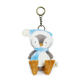 Plush penguin keychain with a blue scarf and hat on a white background