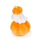 A plush pumpkin-shaped toy with a white fluffy body, small white hands, and a smaller orange pumpkin on its head featuring a light green stem, photographed on a clean white background.