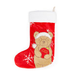 Red Christmas stocking with a bear design holding an ornament, on a white background