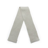 flat lay of Gray knitted scarf on a white background