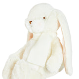 White plush bunny toy on a white background