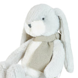 Plush bunny toy with a grey scarf on a white background