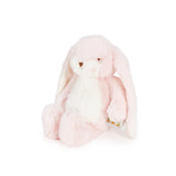 Pink plush bunny toy on a white background