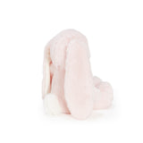Pink stuffed animal rabbit on a white background