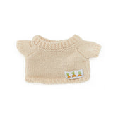 Knitted sweater with a carrot label on a white background