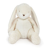 White plush bunny toy with a visible brand tag on a white background