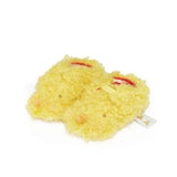 Side view of yellow chick themed baby booties with an elastic closure and red and cream striped lining.