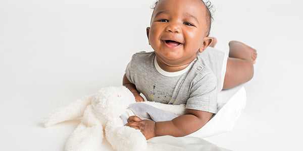Baby with  gray lovie