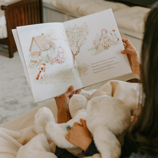 parent and child reading a book