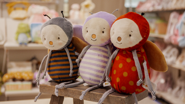 Three whimsical stuffed animal bugs