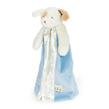 side view Plush puppy toy with attached blue and white blanket on a white background