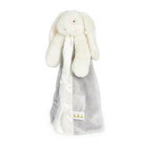 White plush bunny with a gray blanket on a white background