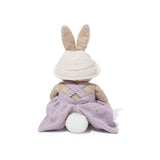 Back view of taupe colored bunny plush on a white background