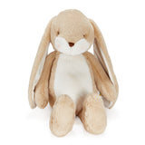 Beige plush bunny toy on a white background