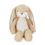 Plush toy rabbit with beige and white fur on a white background