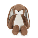 Brown plush bunny toy on a white background