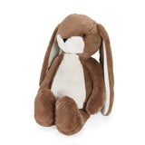 Brown plush bunny toy on a white background