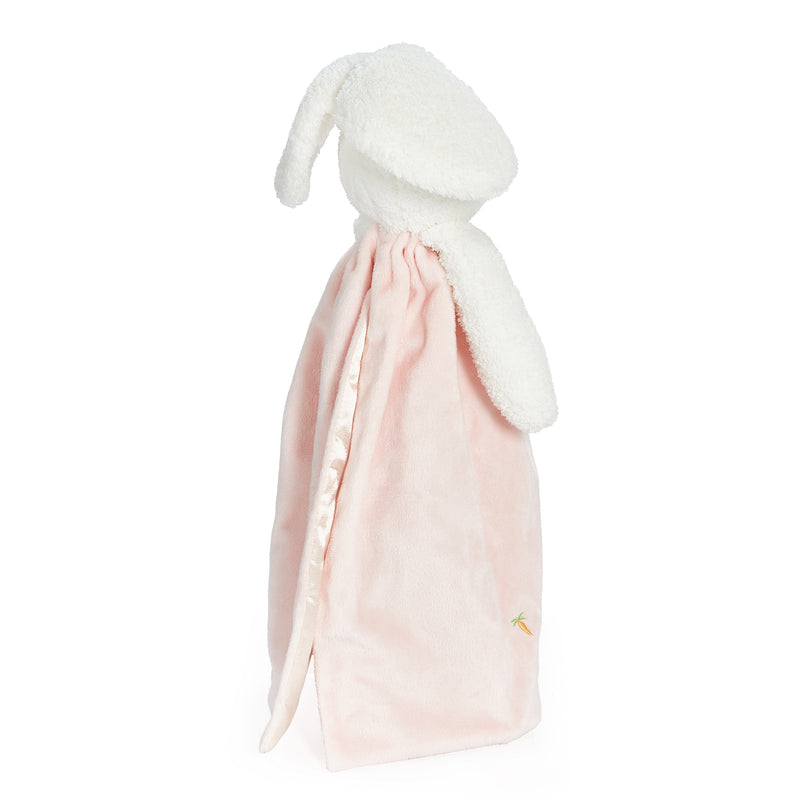 Pink plush toy with white bunny ears on a white background