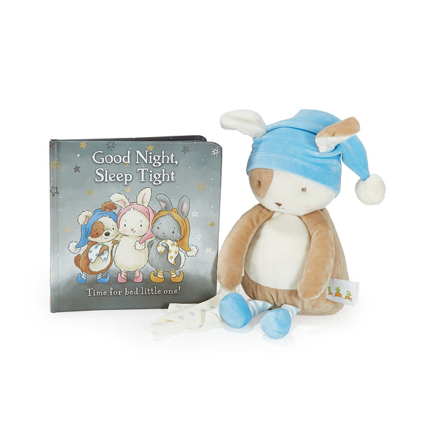 Plush Puppy toy and book titled 'Good Night, Sleep Tight' on a white background
