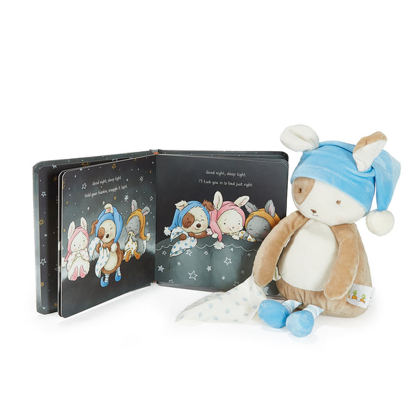 Children's book with illustrations of bunnies and a plush toy puppy wearing a blue nightcap on a white background.