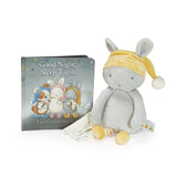 Plush rabbit toy with a yellow hat and book titled 'Good Night, Sleep Tight' on a white background