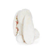 White plush bunny with floral pattern on a white background
