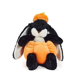 Plush bunny toy with an orange pumpkin costume on a white background