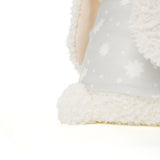 Close-up of a white textured fabric with a blurred background