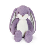 Purple stuffed animal bunny on white background