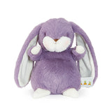 Purple bunny plush on white background