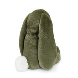 Green plush bunny toy on a white background