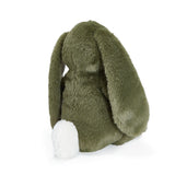 Green plush bunny toy on a white background