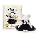 A plush mouse toy dressed in a black tutu dress with a white bow stands in front of its illustrated book cover, which reads 'Claris' and shows a matching mouse illustration in a black dress.