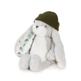 A plush stuffed bunny toy in white and light gray, wearing an olive green knit hat with patterned inner ears, photographed on a clean white background.