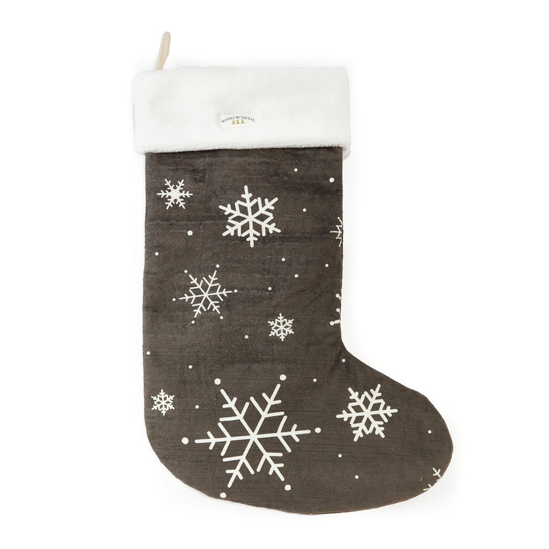 Back view Dark gray Christmas stocking with white snowflake patterns on a white background