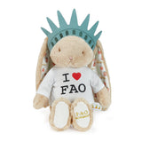 Plush toy resembling the Statue of Liberty with a t-shirt reading 'I ❤️ FAO' on a white background