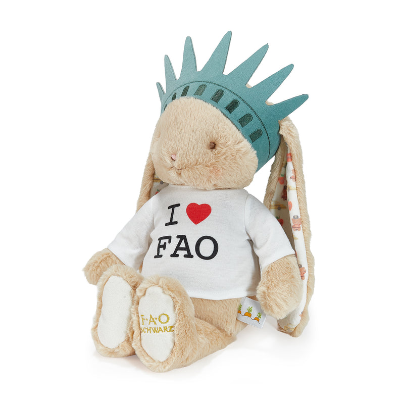 Plush toy with a Statue of Liberty hat and 'I ❤️ FAO' shirt on a white background