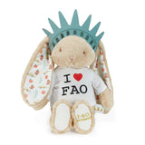 Plush toy with Statue of Liberty hat and 'I ❤️ FAO' shirt on a white background